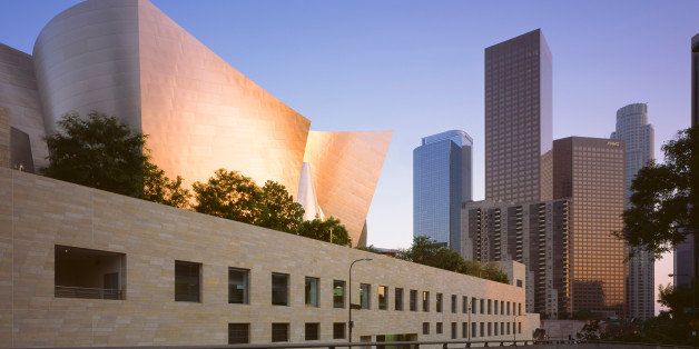 Walt Disney Concert Hall, Los Angeles, United States, Architect Frank Gehry, 2003, Walt Disney Concert Hall Evening View Towards Downtown Along Hope Street (Photo By View Pictures/UIG via Getty Images)