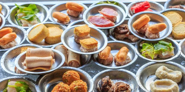 a variety of dim sum in small...