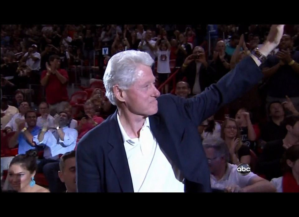 "Bill Clinton waves to fans at Heat game"