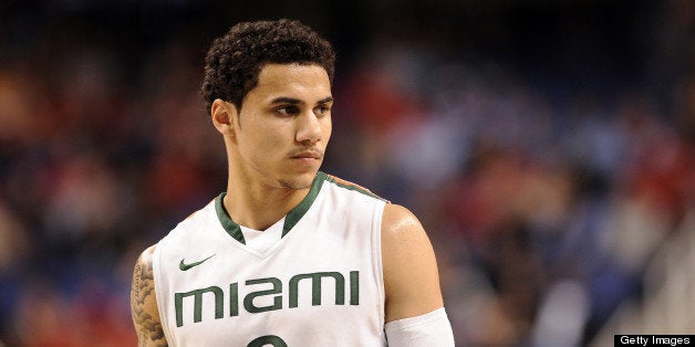 GREENSBORO, NC - MARCH 15: Shane Larkin #0 of the Miami Hurricanes looks on during a game against the Boston College Eagles d
