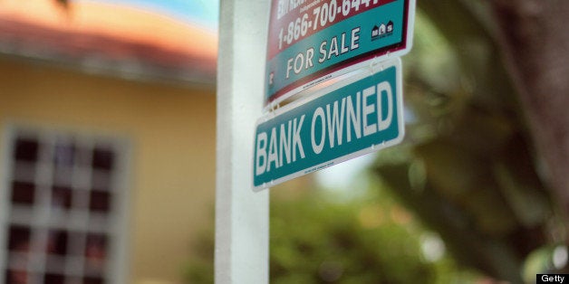 MIAMI - SEPTEMBER 16: A Bank Owned sign is seen in front of a foreclosed home on September 16, 2010 in Miami, Florida. RealtyTrac, an online marketplace for foreclosure properties, released its U.S. Foreclosure Market Report for August 2010, which shows foreclosure filings - default notices, scheduled auctions and bank repossessions - were reported on 338,836 properties in August, a 4 percent increase from the previous month. (Photo by Joe Raedle/Getty Images)