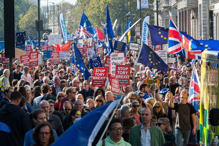 Thousands of people march through London demanding a vote on the final Brexit deal.