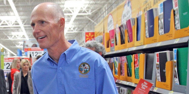 Florida Gov. Rick Scott shops on first day of the back-to-school tax holiday at a Wal-Mart in Orlando, Florida, Friday, August 12, 2011. (Red Huber/Orlando Sentinel/MCT via Getty Images)