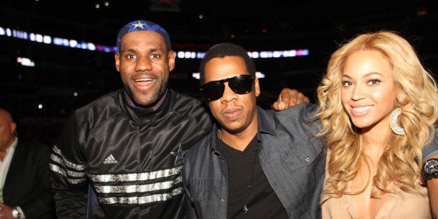 LOS ANGELES, CA - FEBRUARY 20: LeBron James #6 of the Eastern Conference talks with Rapper Jay-Z and Singer Beyonce during t