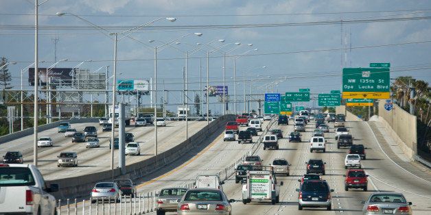 UNITED STATES - DECEMBER 14: Traffic on the highway heading out of Miami at Opa Locka Boulevard, Florida, United States of America (Photo by Tim Graham/Getty Images)