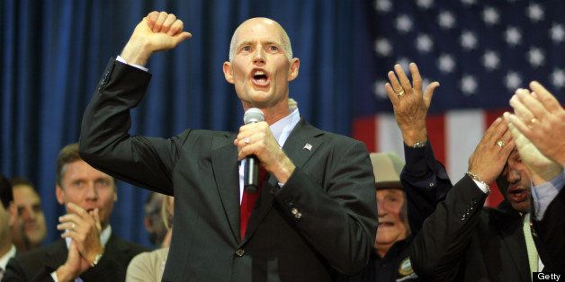 SWEETWATER, FL - AUGUST 31: Rick Scott, the Republican candidate for governor of Florida, as he campaigns at the Sweetwater Youth Center on August 31, 2010 in Sweetwater, Florida. Scott, who spent millions of dollars of his own money to beat his primary opponent, is running against Democrat Alex Sink and independent Lawton 'Bud' Chiles III. (Photo by Joe Raedle/Getty Images)