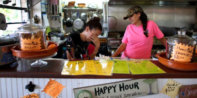 MIAMI, FL - OCTOBER 07: Letty Mendez (L) and Elsa DeVito wait for customers at Gator Grill which is on the road near the entrance to the Everglades National Park on October 7, 2013 in Miami, Florida. Elsa DeVito, the owner, said she has seen an 85 percent drop in business since the park was closed as the United States House and Senate are into day 7 of not being able to agree on a bill to fund the United States government. National Parks around the nation are closed along with other federal services. (Photo by Joe Raedle/Getty Images)