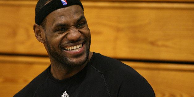 HURLBURT FIELD, FL - SEPTEMBER 30: LeBron James of the Miami Heat shares a laugh after Miami Heat Training Camp on September 30, 2010 at Aderholt Gym in Hurlburt Field, Florida. NOTE TO USER: User expressly acknowledges and agrees that, by downloading and/or using this Photograph, User is consenting to the terms and conditions of the Getty Images License Agreement. Mandatory copyright notice: Copyright NBAE 2010 (Photo by Issac Baldizon/NBAE via Getty Images)