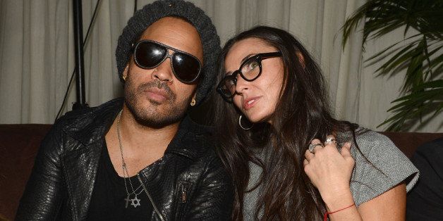 MIAMI BEACH, FL - DECEMBER 05: Musician Lenny Kravitz and actress Demi Moore attend a Beachside Barbecue presented by CHANEL hosted by Art.sy Founder Carter Cleveland, Larry Gagosian, Wendi Murdoch, Peter Thiel and Dasha Zhukova at Soho Beach House on December 5, 2012 in Miami Beach, Florida. (Photo by Dimitrios Kambouris/Getty Images for CHANEL)