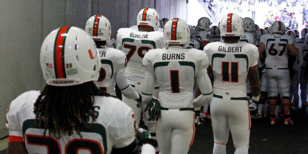 PITTSBURGH, PA - NOVEMBER 29: The Miami Hurricanes take the field against the Pittsburgh Panthers on November 29, 2013 at Heinz Field in Pittsburgh, Pennsylvania. (Photo by Justin K. Aller/Getty Images)