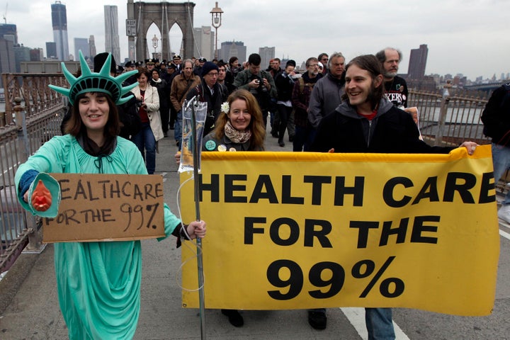 Occupy Wall Street Protesters March Over Brooklyn Bridge For Six Month ...