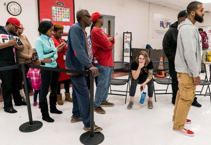 Long lines at the polls in Georgia on Tuesday were a reminder that voting in many minority communities is difficult, which may have something to do with the Republican state officials in charge.