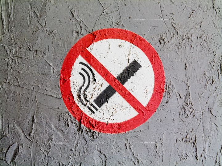 no smoking sign drawn at wall