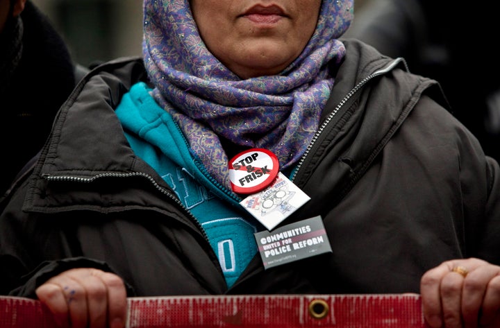 NEW YORK, NY - MARCH 18: A woman participates in a demonstration against the city's 'stop and frisk' searches in lower Manhattan near Federal Court March 18, 2013 in New York City. Hearings in a federal lawsuit filed by four black men against the city police department's 'stop and frisk' searches starts today in Manhattan Federal Court. (Photo by Allison Joyce/Getty Images)