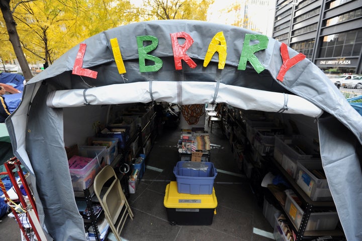 The Occupy Wall Street library in Zuccotti Park on November 14, 2011 in New York, one day before New York City police evicted the protesters. The books were thrown into garbage trucks during the eviction and taken to a sanitation depot where demonstrators recovered some of them, many badly damaged. AFP PHOTO/Stan HONDA (Photo credit should read STAN HONDA/AFP/Getty Images)