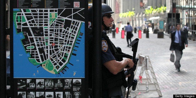 NEW YORK, NY - SEPTEMBER 09: An NYPD tactical police officer stands guard near the New York Stock Exchange on September 9, 2011 in New York City. Officials are stepping up security in New York and Washington D.C. a day after U.S. officials received a credible but unconfirmed terror threat to utilize car bombs on bridges or tunnels in New York or Washington. (Photo by Justin Sullivan/Getty Images)