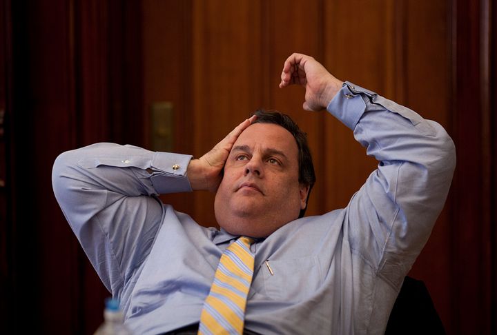 Chris Christie, governor of New Jersey, pauses while speaking to reporters at the Statehouse in Trenton, New Jersey, U.S., on Friday, Jan. 4, 2013. The U.S. Congress cleared the first installment of disaster aid for victims of Hurricane Sandy after harsh criticism of House leaders by fellow Republicans including Christie for canceling an earlier vote. Photographer: Emile Wamsteker/Bloomberg via Getty Images 