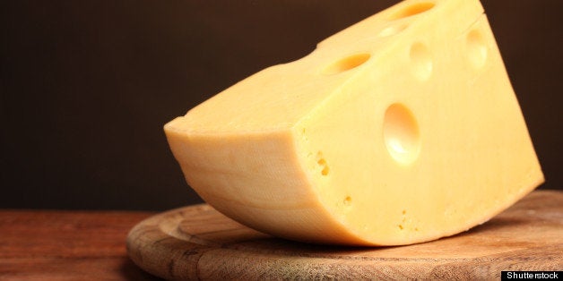 heese on wooden board in the...