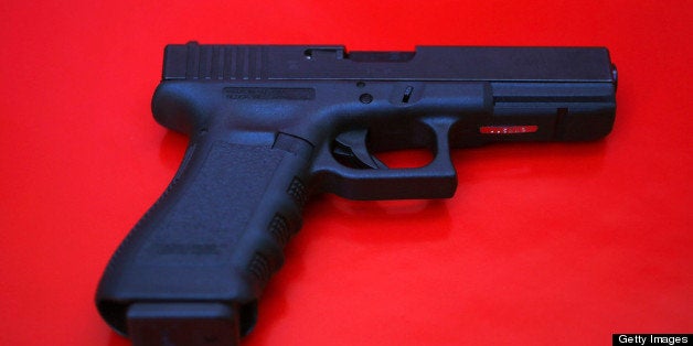 MIAMI, FL - DECEMBER 18: In this photo illustration a Glock pistol is seen on December 18, 2012 in Miami, Florida. The weapo