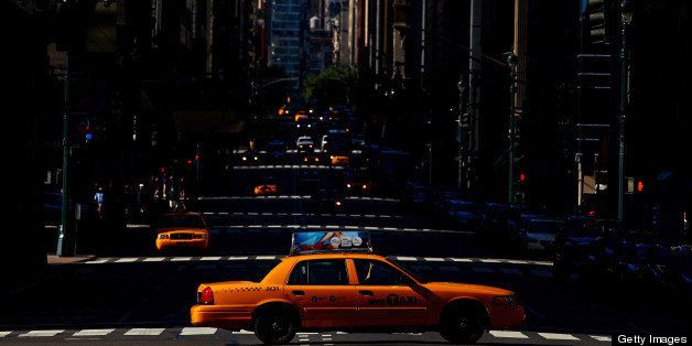 NEW YORK, NY - SEPTEMBER 09: A yellow taxi cab crosses a street in Midtown Manhattan on September 9, 2012 in New York City. (Photo by Dan Istitene/Getty Images)