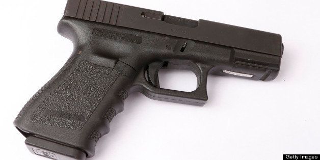PROVO, UT - JULY 23: In this photo illustration, a Glock 23, 40 caliber handgun is seen on July 23, 2012 in Provo, Utah. It has been reported that this is the same make and model of the one of the guns that James Holmes used in the theatre shooting in Aurora, Colorado killing 12 on July 20, 2012. (Photo illustration by George Frey/Getty Images)