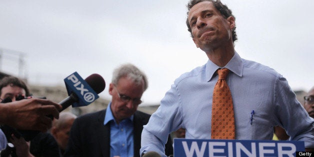 NEW YORK, NY - MAY 23: Anthony Weiner listens to a question from the media after courting voters outside a Harlem subway station a day after announcing he will enter the New York mayoral race on May 23, 2013 in New York City. Weiner is joining the Democratic race to succeed three-term Mayor Michael Bloomberg after he was forced to resign from Congress in 2011 following the revelation of sexually explicit online behavior. (Photo by Mario Tama/Getty Images)