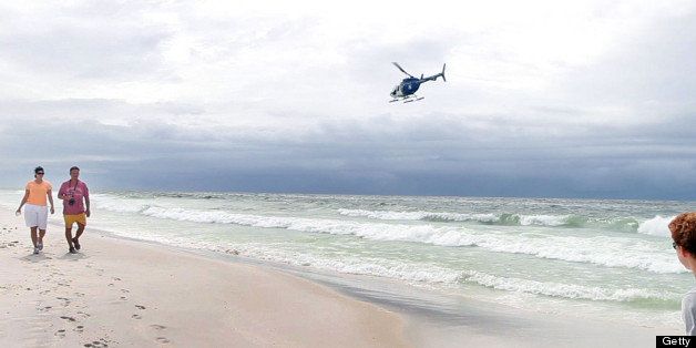 A news helicopter flies over the beach in Pensacola, Florida, on Tuesday, June 29, 2010. (Lilly Echeverria/Miami Herald/MCT via Getty Images)