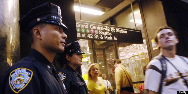 New York, UNITED STATES: New York City Police Department officers are posted outside the Grand Central Terminal subway station, 06 October, 2005. New York ramped up security on its subway system Thursday after receiving a specific threat of a terrorist attack in the coming days, New York Mayor Michael Bloomberg and police officials said. 'This is the first time that we have had a threat with this level of specificity,' Bloomberg said. 'It was more specific as to target, it was more specific as to timing.' AFP PHOTO/Stan HONDA (Photo credit should read STAN HONDA/AFP/Getty Images)