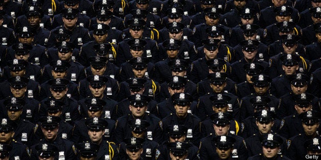 NEW YORK, NY - JULY 02: New York City Police Academy cadets attend their graduation ceremony at the Barclays Center on July