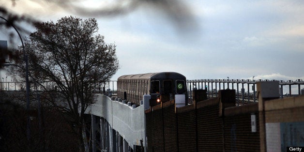 NEW YORK, NY - DECEMBER 05: A train arrives at a stop in Brooklyn two days after a man was pushed to his death in front of a