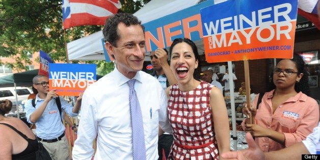 Mayorial candidate Anthony Weiner and his wife Huma Abedin campaigning on W. 111 St. (Photo by Andrew Savulich/NY Daily News