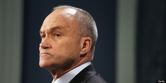 NEW YORK, NY - APRIL 16: New York City Police Commissioner Ray Kelly addresses the media at City Hall on April 16, 2013 in New York City. Behind them the Boston and New York flags stand side by side. Police were out in force throughout New York, a day after expolosions near the finish line of the Boston Marathon killed 3 people and wounded more than 170 more, many of them critically. (Photo by John Moore/Getty Images)