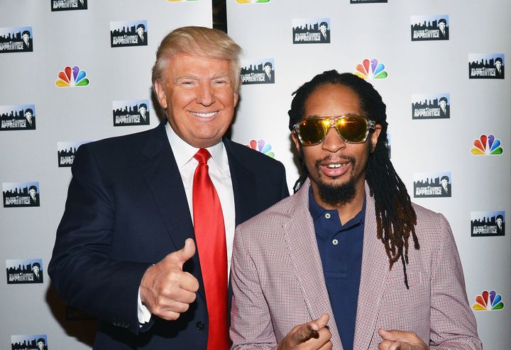 Donald Trump and Lil Jon attend a red carpet event at Trump Tower on May 16, 2013, in New York City.