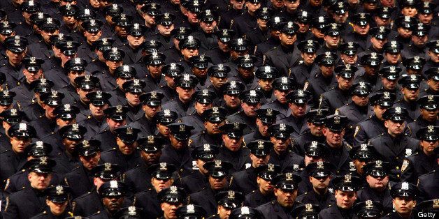 UNITED STATES - DECEMBER 26: A sea of blue fills Madison Square Garden as 1,359 new police officers attend an NYPD graduation ceremony. This graduating class, one of the most diverse ever, includes 28 percent of Hispanic origin, 17 percent black, 8 percent Asian, one percent from other ethnic groups, and 18 percent female. (Photo by Craig Warga/NY Daily News Archive via Getty Images)