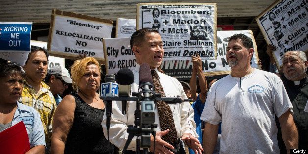 NEW YORK, NY - AUGUST 02: New York City mayoral candidate and former city comptroller John Liu, speaks at a protest against the eviction of over two hundred small businesses on August 2, 2013 in the Willet's Point neighborhood of the Queens borough of New York City. The neighborhood has been in a battle with the city of New York for years, which hopes to demolish the neighborhood and invest $3 billion for a mall, apartments and more parking for nearby Citi Field. Members of the neighborhood argue that hundreds of small businesses are established in the neighborhood and should not be evicted. (Photo by Andrew Burton/Getty Images)