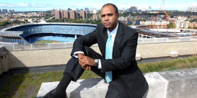 UNITED STATES - OCTOBER 12: Bronx Boro President Adolfo Carrion on the roof of the Bronx Courthouse with the old and the new Yankee Stadium behind him. (Photo by Susan Watts/NY Daily News Archive via Getty Images)