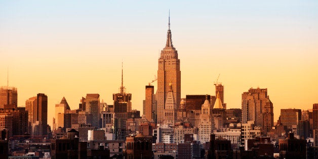 Skyline of New York with Empire State Building- see from Brooklyn bridge