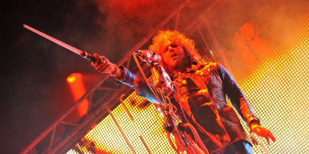 NEWPORT, UNITED KINGDOM - SEPTEMBER 06: Wayne Coyne of The Flaming Lips performs on stage during Day 2 of Bestival 2013 at Robin Hill Country Park on September 6, 2013 in Newport, Isle of Wight. (Photo by C Brandon/Redferns via Getty Images)