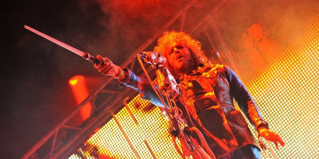 NEWPORT, UNITED KINGDOM - SEPTEMBER 06: Wayne Coyne of The Flaming Lips performs on stage during Day 2 of Bestival 2013 at Robin Hill Country Park on September 6, 2013 in Newport, Isle of Wight. (Photo by C Brandon/Redferns via Getty Images)