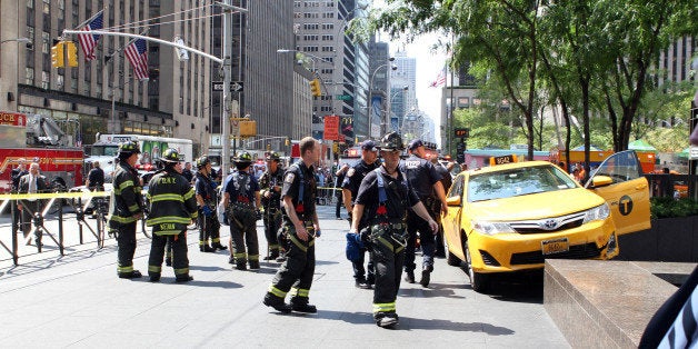 Firefighters, Dr. Oz and bystanders rushed to tourist Sian Green struck by out-of-control taxi cab on Sixth Ave. and W. 49th