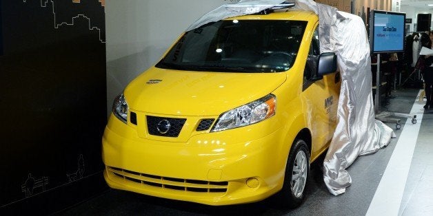 Nissan's NV200, 'New York taxi of tomorrow' is unveiled during its press preview in Tokyo on October 9, 2013. Nissan displays a production model of New York city's next-generation yellow cab at the Matsuya Ginza department store during the store's one-week-long New York week fair. AFP PHOTO / TOSHIFUMI KITAMURA (Photo credit should read TOSHIFUMI KITAMURA/AFP/Getty Images)