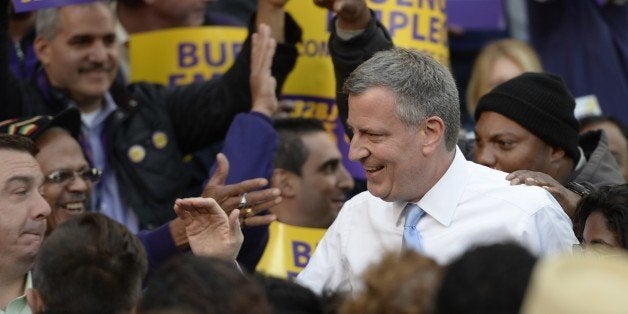 New York City Democratic mayoral candidate Bill de Blasio speaks to a 'Labor Get out to Vote Rally' at Brooklyn Borough Hall in New York on November 1, 2013. New Yorkers go to the polls on November 5 to elect a new mayor. AFP PHOTO / TIMOTHY CLARY (Photo credit should read TIMOTHY CLARY/AFP/Getty Images)