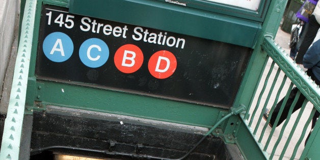 UNITED STATES - APRIL 07: Straphangers exit the 145th St. subway station on St. Nicholas Ave. after walking along the subway tracks when an underground circuit breaker malfunction ground trains to a halt, causing a smoke condition. Hundreds of subway riders were evacuated as service was disrupted on the A, C, B and D lines. (Photo by Craig Warga/NY Daily News Archive via Getty Images)