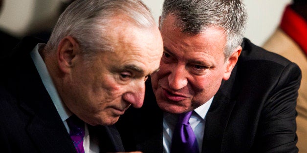 NEW YORK CITY - DECEMBER 7: (L-R) Newly selected police commissioner Bill Bratton and Mayor-elect Bill De Blasio attend a Nelson Mandela tribute at the National Action Network in Harlem on December 7, 2013 in New York City. Mandela, also known as Tata Madiba, passed away on the evening of December 5th at his home in Houghton at the age of 95. Mandela became South Africa's first black president after being jailed for decades for his activism against apartheid in a racially-divided South Africa. (Photo by Christopher Gregory/Getty Images)