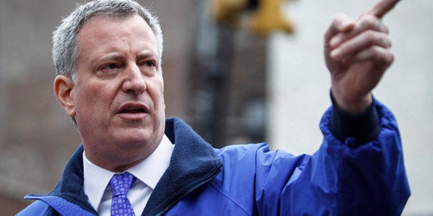 NEW YORK, NY - MARCH 12: New York Mayor Bill de Blasio speaks during a press conference to give an update on a five-alarm fire and building collapse at 1646 Park Ave in the Harlem neighborhood of Manhattan March 12, 2014 in New York City. Reports of an explosion were heard before the collapse of two multiple-dwelling buildings that left at least 17 people injured. (Photo by Kena Betancur/Getty Images)