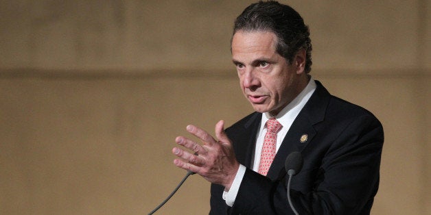 NEW YORK, NY - MAY 15: New York Gov. Andrew Cuomo speaks during the dedication ceremony at the National September 11 Memorial Museum May 15, 2014 in New York City. The museum spans seven stories, mostly underground, and contains artifacts from the attack on the World Trade Center Towers on September 11, 2001 that include the 80 ft high tridents, the so-called 'Ground Zero Cross,' the destroyed remains of Company 21's New York Fire Department Engine as well as smaller items such as letter that fell from a hijacked plane and posters of missing loved ones projected onto the wall of the museum. The museum will open to the public on May 21. (Photo by John Munson-Pool/Getty Images)