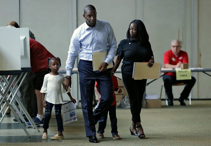 Andrew Gillum at the polls with his family.