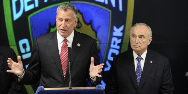 Mayor De Blasio Commissioner Bratton and District Attorney Cyrus Vance announce initiative to enhance NYPD mobile communications. 55 Broadway NY, NY. October 23, 2014. (Photo By: Corey Sipkin/NY Daily News via Getty Images)