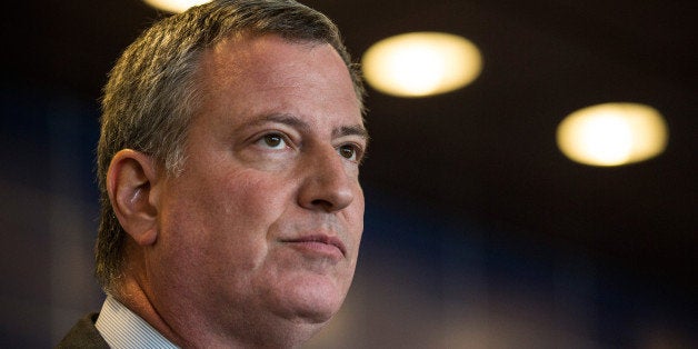 NEW YORK, NY - DECEMBER 04: New York City Mayor Bill de Blasio speaks at a press conference after witnessing police being retrained with new guidelines at the Police Academy on December 4, 2014 in the College Point neighborhood of the Queens borough of in New York City. The new police guidelines come on the heels of numerous national incidences where white police officers have killed black men. (Photo by Andrew Burton/Getty Images)