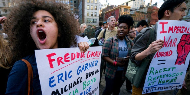 Protesters yell out in Union Square Wednesday, April 29, 2015, in New York. People gathered to protest the death of Freddie Gray, a Baltimore man who was critically injured in police custody. (AP Photo/Craig Ruttle)